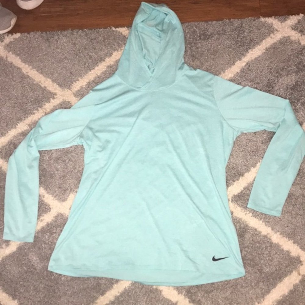 Teal Nike dry-fit light weight pull over.
